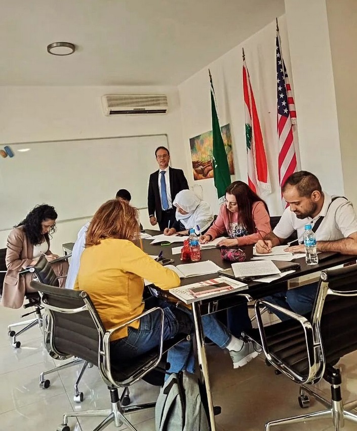 IELTS professor guiding a student